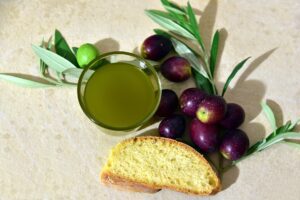 Virgin Olive Oil with olves and bread- Olive oil nutrition Value
